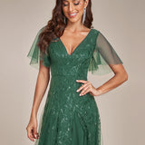 Manuela | Vestido de noite longo, romântico e cintilante com decote em V e tiras