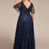 Manuela | Vestido de noite longo, romântico e cintilante com decote em V e tiras
