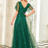 Manuela | Vestido de noite longo, romântico e cintilante com decote em V e tiras