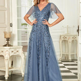 Manuela | Vestido de noite longo, romântico e cintilante com decote em V e tiras