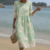Gabi | Vestido Midi com Estampa de Plantas e Flores